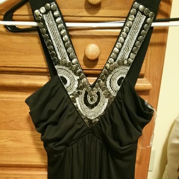 Cute dress! Knee length.