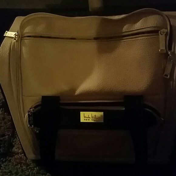 Brand new, never used Nicole Miller carry on bag