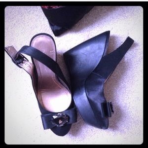 BCBG black wedges with a bow