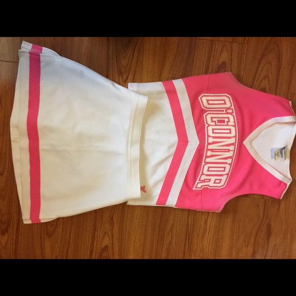 Pink cheerleading uniform.