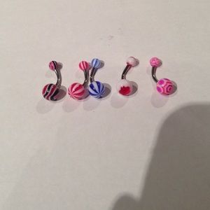 Brand new never used 5 bellybutton rings