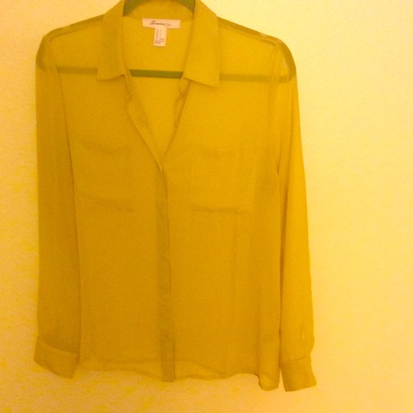 Mustard blouse.