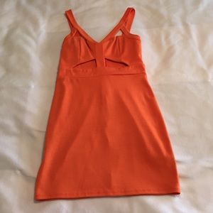 Neon orange bodycon dress with cut outs