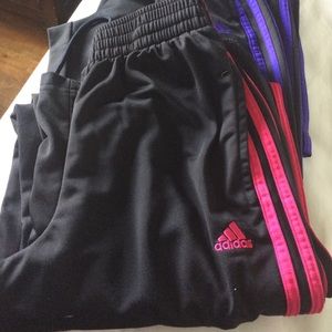 Two Adidas track pants.size small