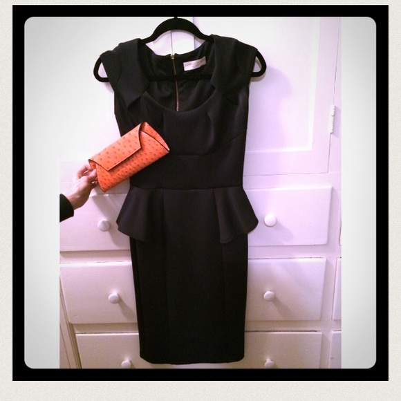 RESERVED FOR @jasloan Beautiful peplum navy dress
