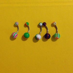 5 multicolored belly button rings.