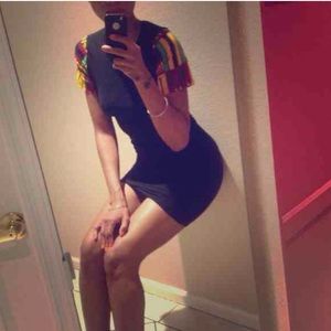 Peekaboo back, black dress w/ Kente Cloth sleeves