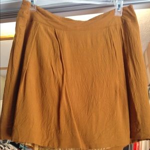 Cute mustard yellow short skirt