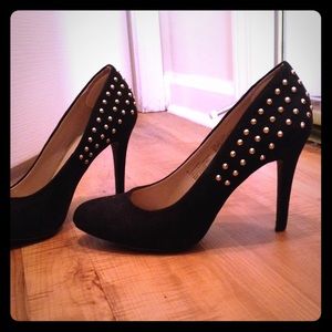 Black studded pumps