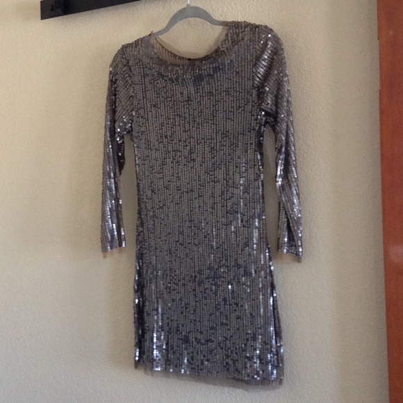 Silver sequined dress.
