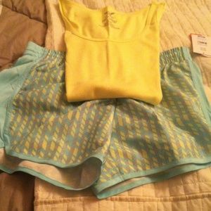 Neon yellow tank & blue, yellow, green shorts