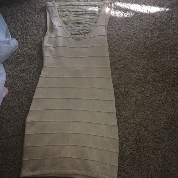 A tan body fitting dress - Picture 1 of 4