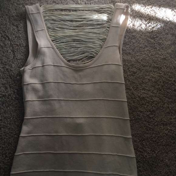 A tan body fitting dress - Picture 2 of 4