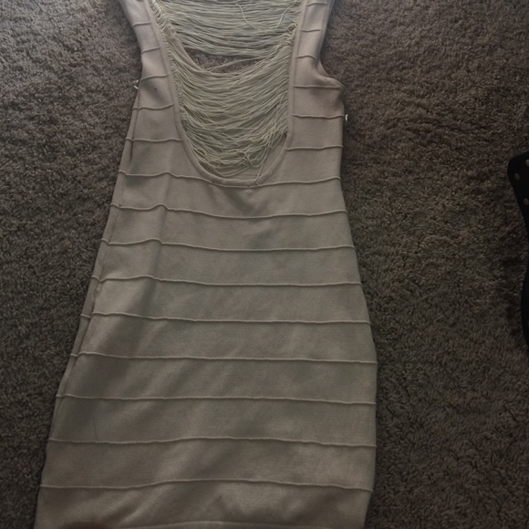 A tan body fitting dress - Picture 4 of 4