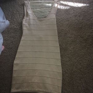A tan body fitting dress
