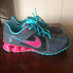 Pink, blue and grey Nike shoes