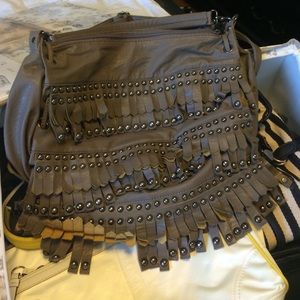 Round studded fringe purse