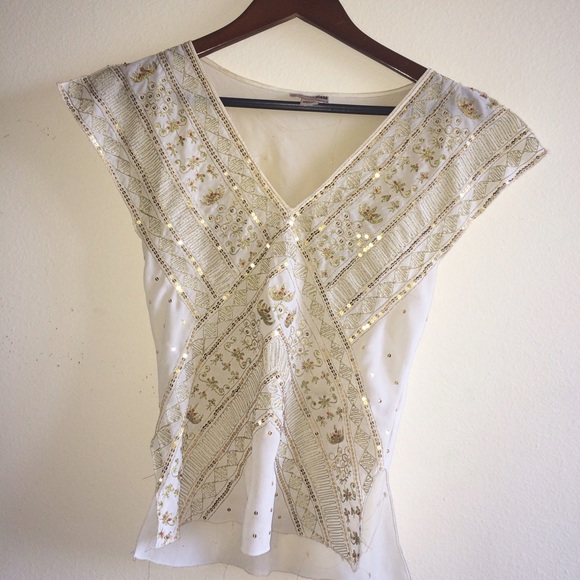 White oriental top with gold embroidery