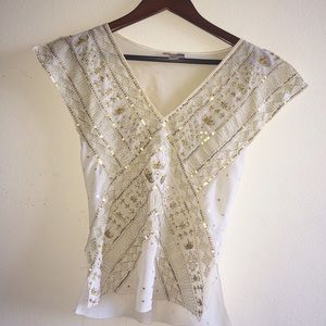 White oriental top with gold embroidery