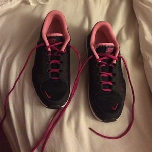 Black and pink nike running shoes