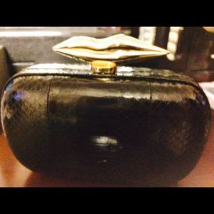DVF Snakeskin clutch purse