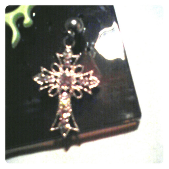 Brand new cross belly ring.
