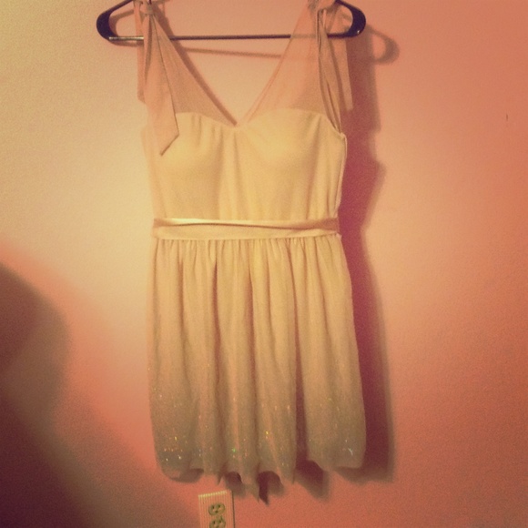 Delia's dusty rose dress with satin sash & sequin