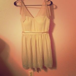 Delia's dusty rose dress with satin sash & sequin