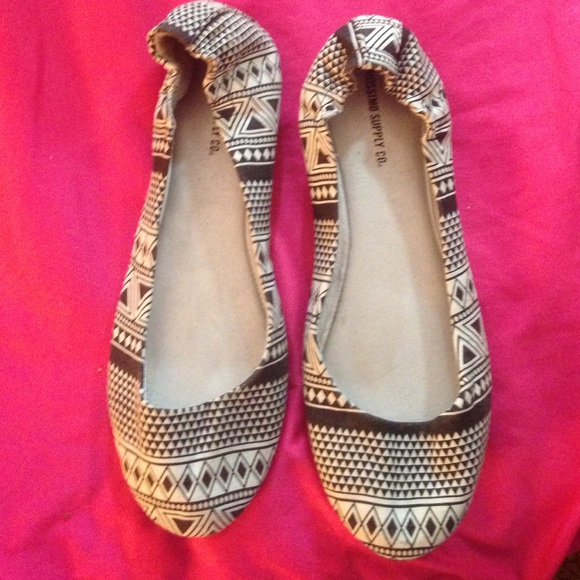 Tribal flats never worn
