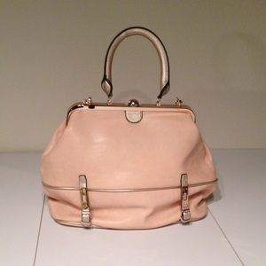 Blush and gold framed bag