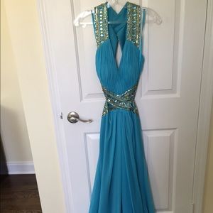 Elegant open back dress.gemstones.