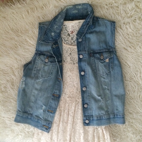 Distressed denim vest