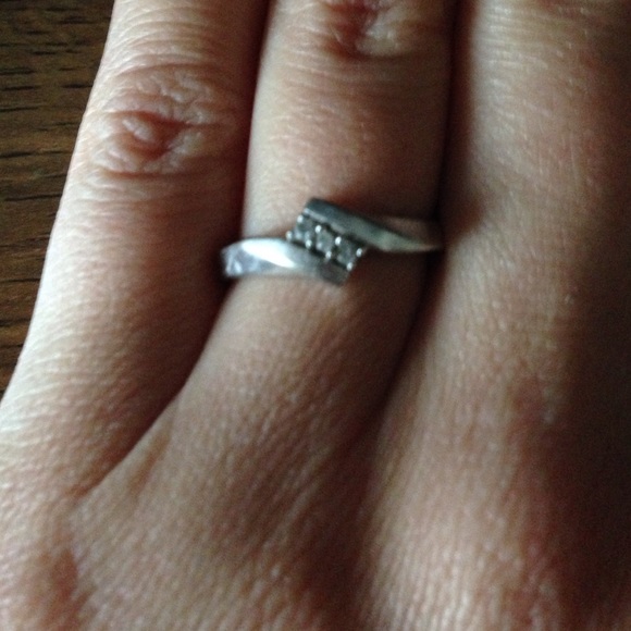 Small 1/16 karat diamond ring