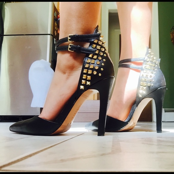 Black heels with gold spikes