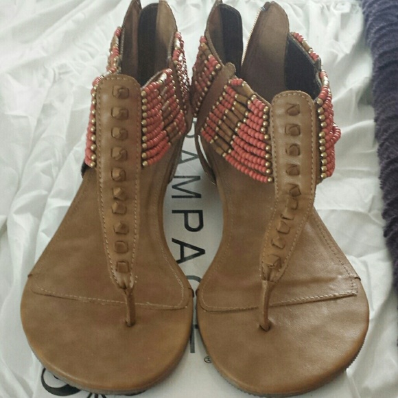 Gently worn tan sandals