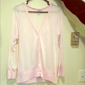 Pink long sleeve w/ buttons.