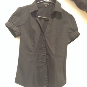 Black button up blouse.