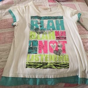 White, blue shirt, "blah blah"