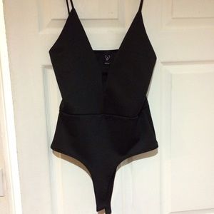 Windsor cut out bodysuit size m/l