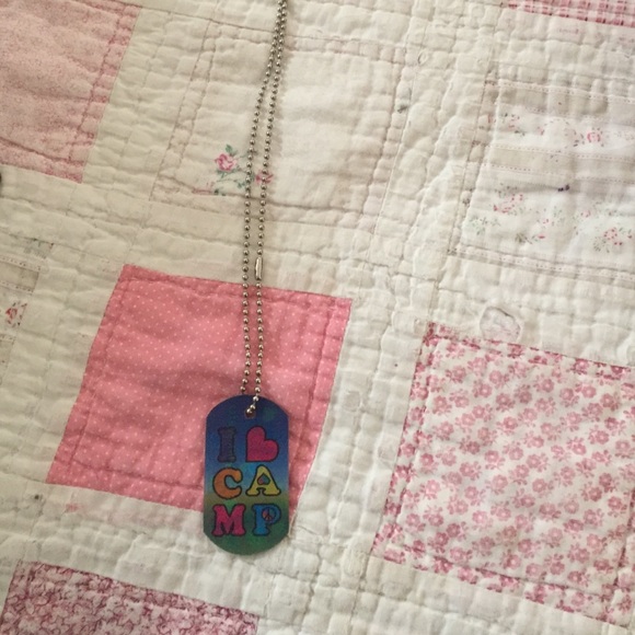 dogtag, like brand new! changes colors