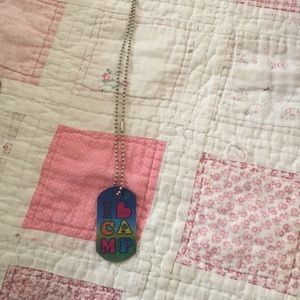 dogtag, like brand new! changes colors