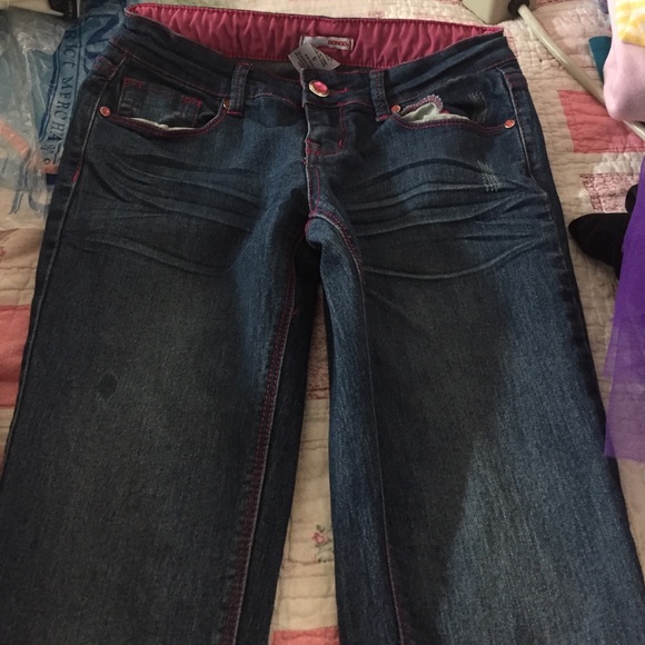 blue jeans w/ pink trimming