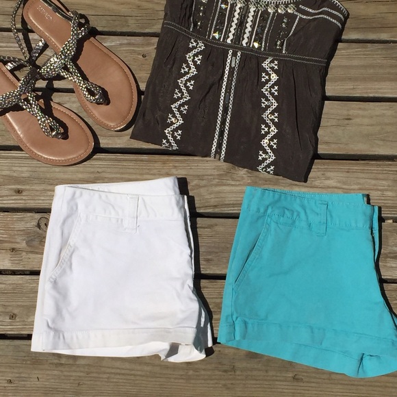 Two pairs of blue and white cotton shorts