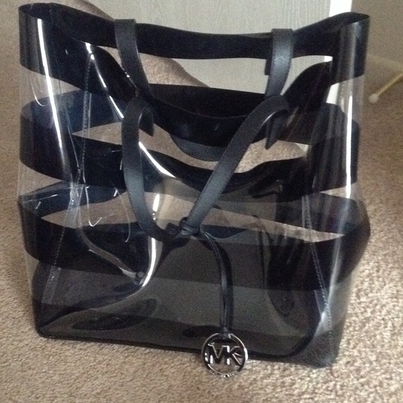 Michael kors black and clear stripped tote.