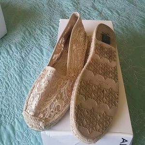 Shoe says size 7. Will fit 6.5  Espadrille flats