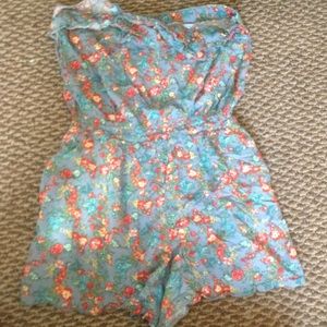 Floral/tribal print rompers. 3 for 20 or $9 each