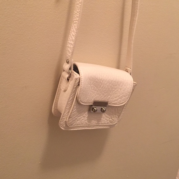 White cross bag