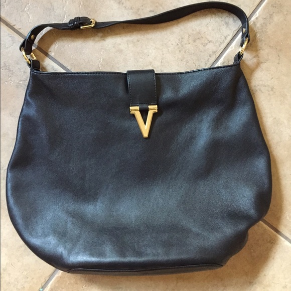 Vince Camuto black leather hobo with gold hardware