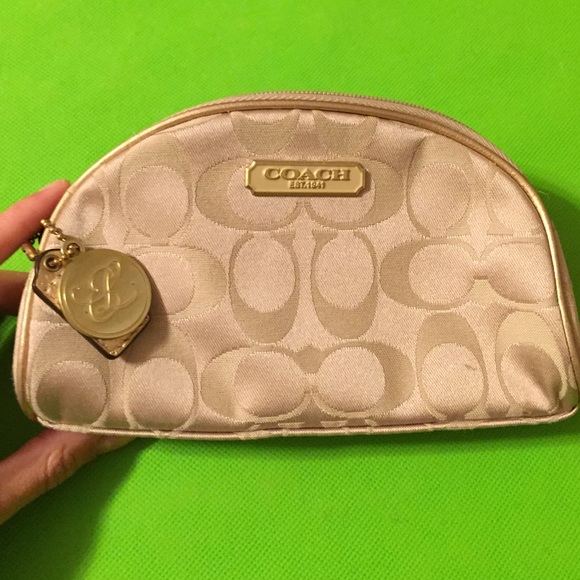 Coach Handbags - Limited edition Coach clutch or makeup bag
