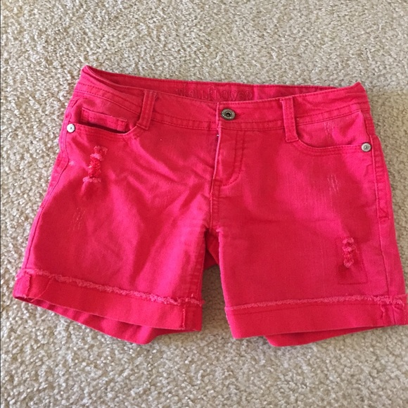 Distressed red shorts